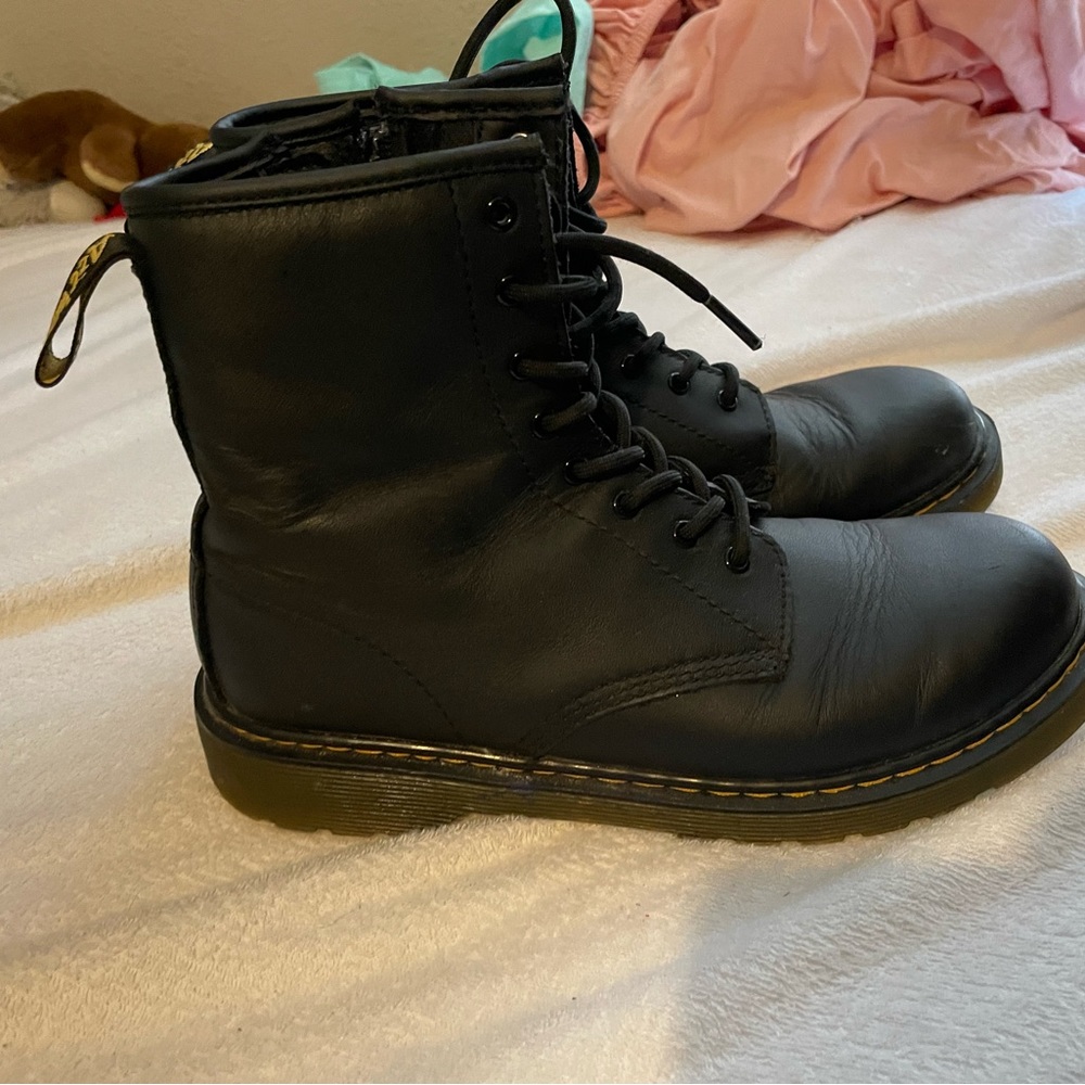 Doc!!! They go with pretty much everything.  Gentle condition.